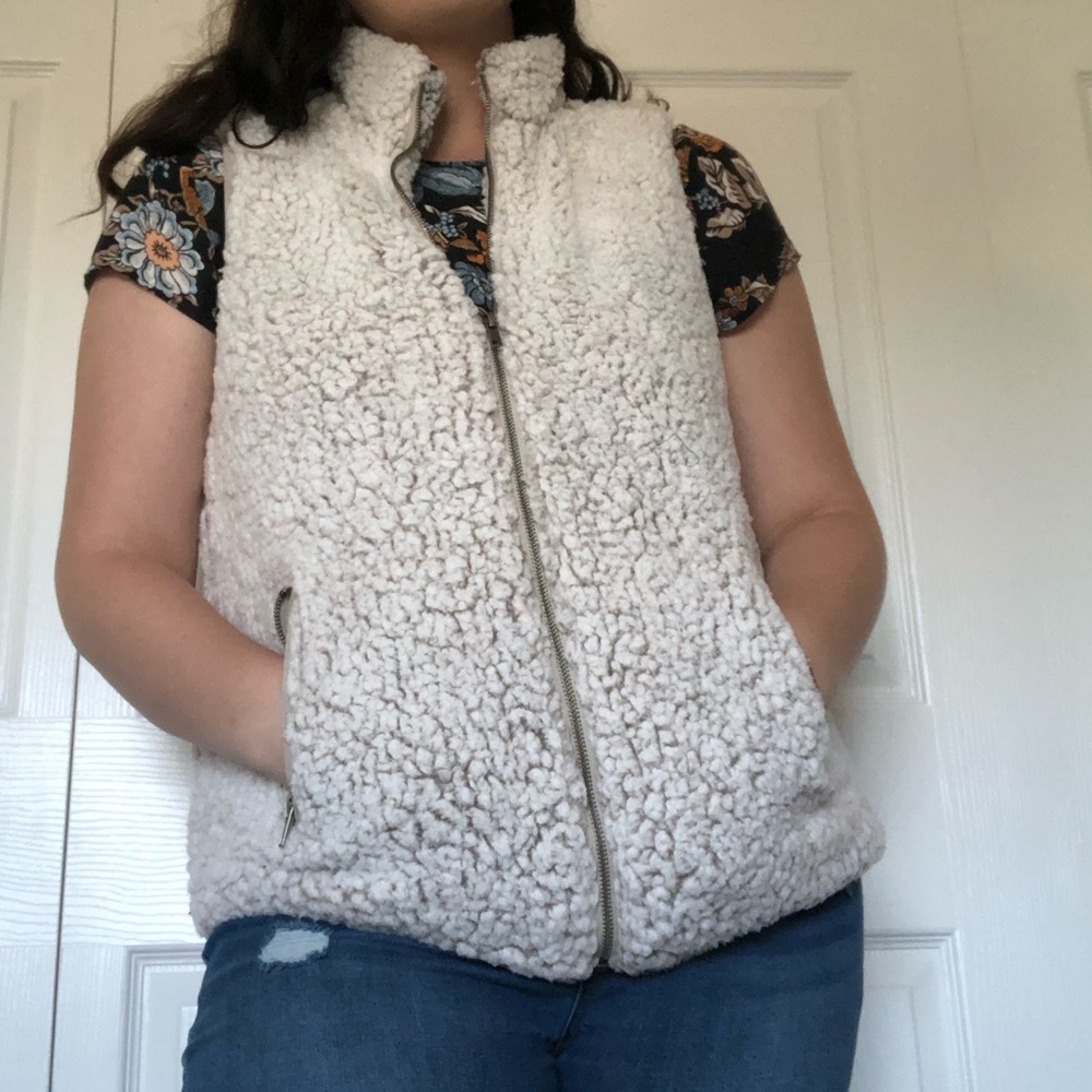 Francesca’s white Sherpa vest